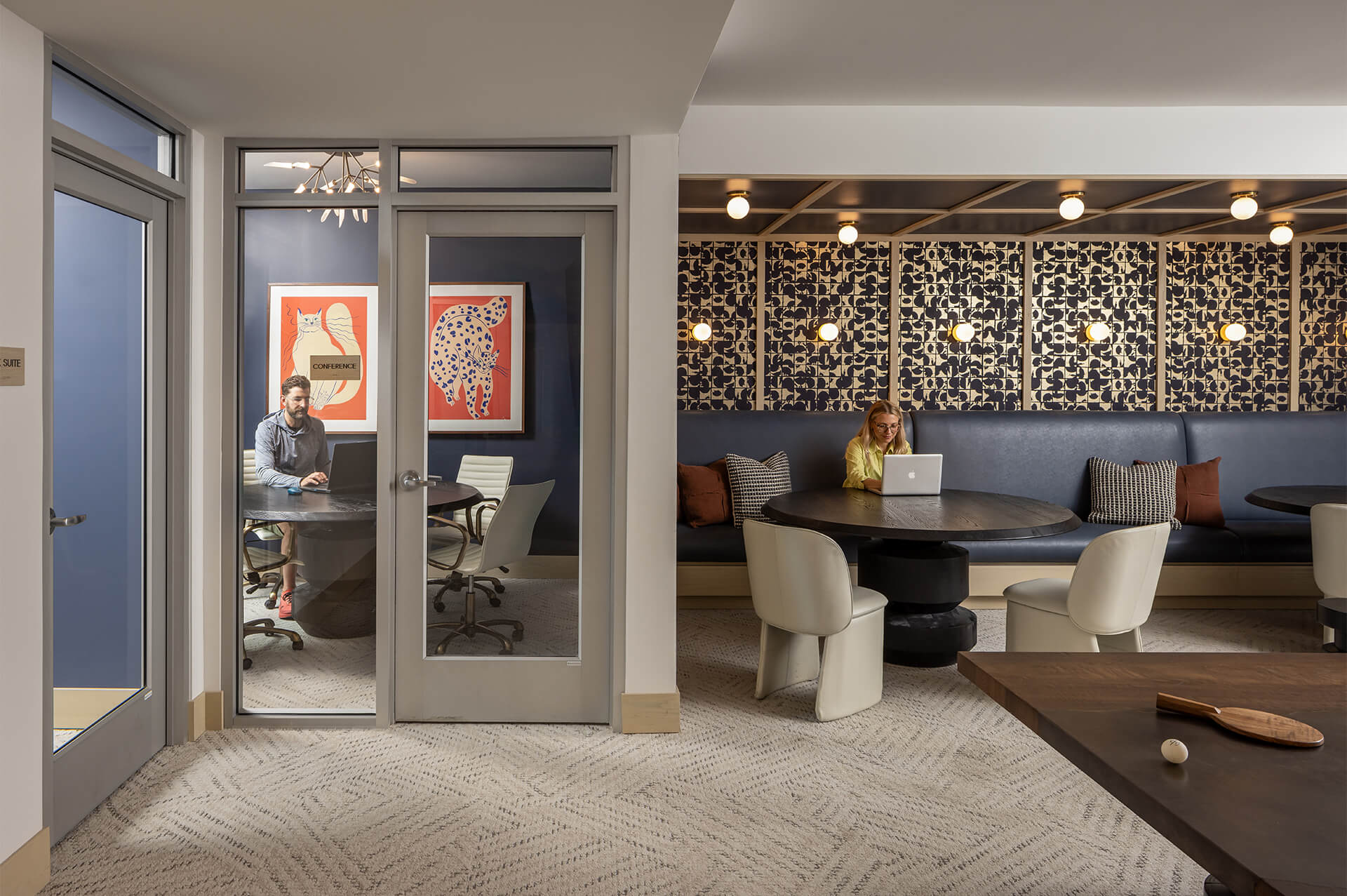 Co-working and conference area at The Harlan Oakdale with modern seating