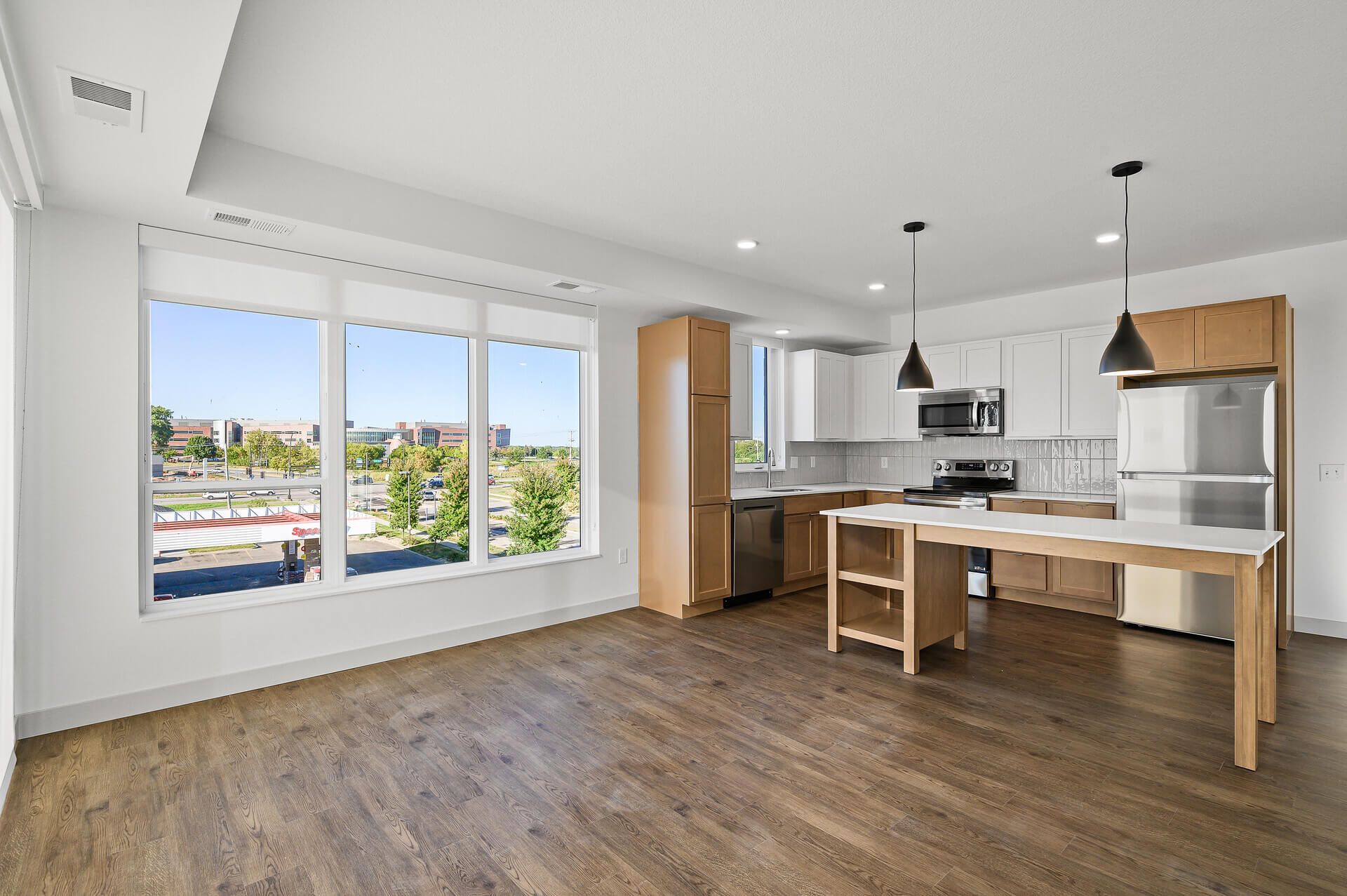 Spacious kitchen and dining area with natural light