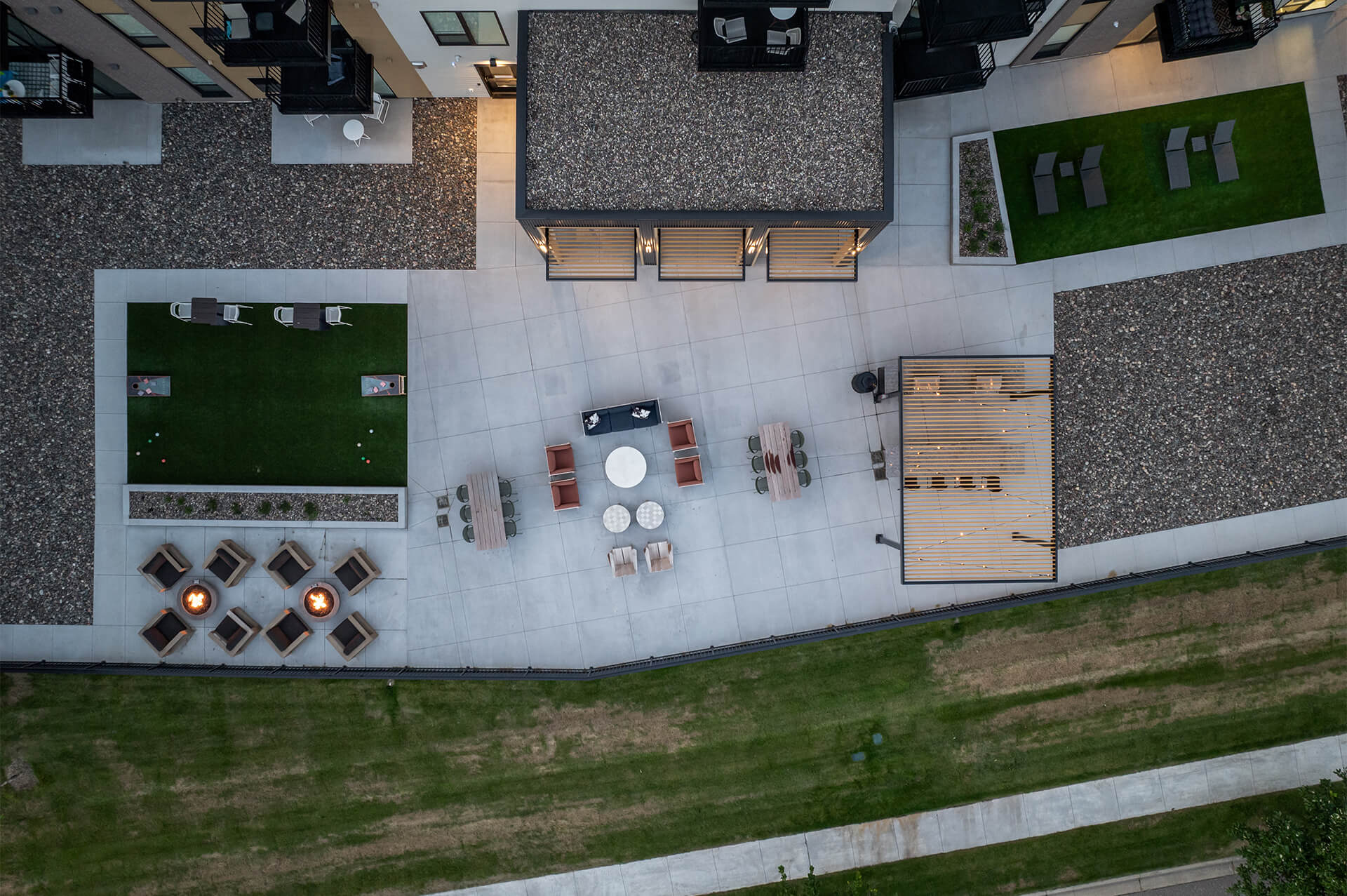 Aerial view of The Harlan Oakdale amenities including seating, fire pits, and bocce ball